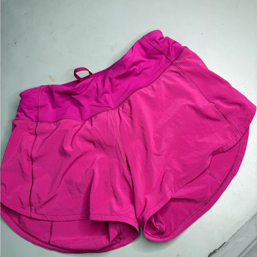 Lululemon Bright Pink Athletic Shorts. Drawstring inside and back zipper pocket
